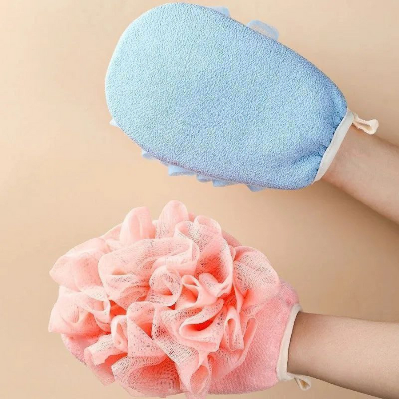 Soft and exfoliating bath scrubbers in pink, blue, green, and grey.