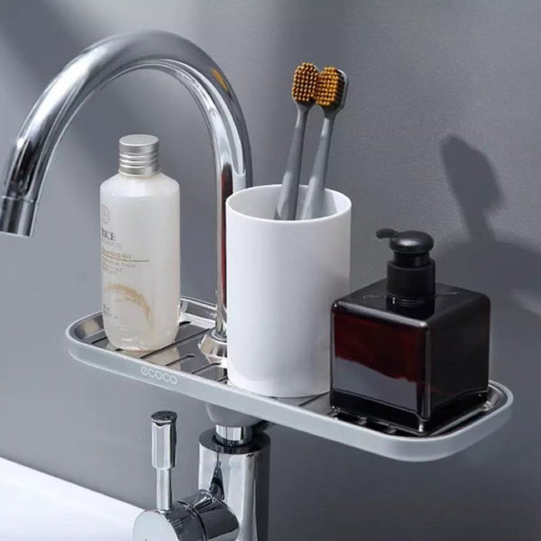 https://www.cupindy.com/cdn/shop/products/ecoco-faucet-sponge-soap-drainage-storage-rack-sink-adjustable-dish-cloth-drain-holder-bathroom-kitchen-accessories-organizercupindy-435486_600x600_crop_center.jpg?v=1691520166